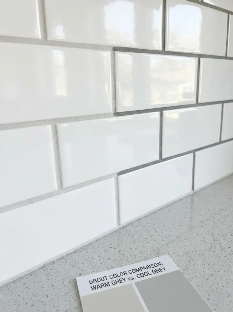 White subway tile with soft light grey grout defining the pattern