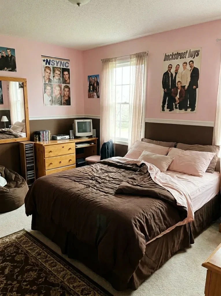 Dark chocolate brown and pale pink bedding layered on a twin bed